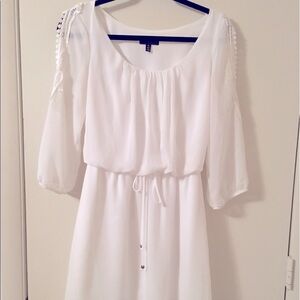 White dress with lace accent and tie waist